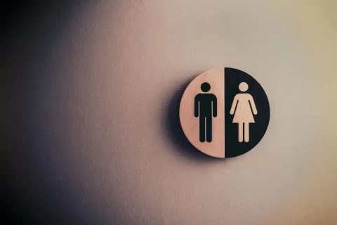 Bathroom sign on wall